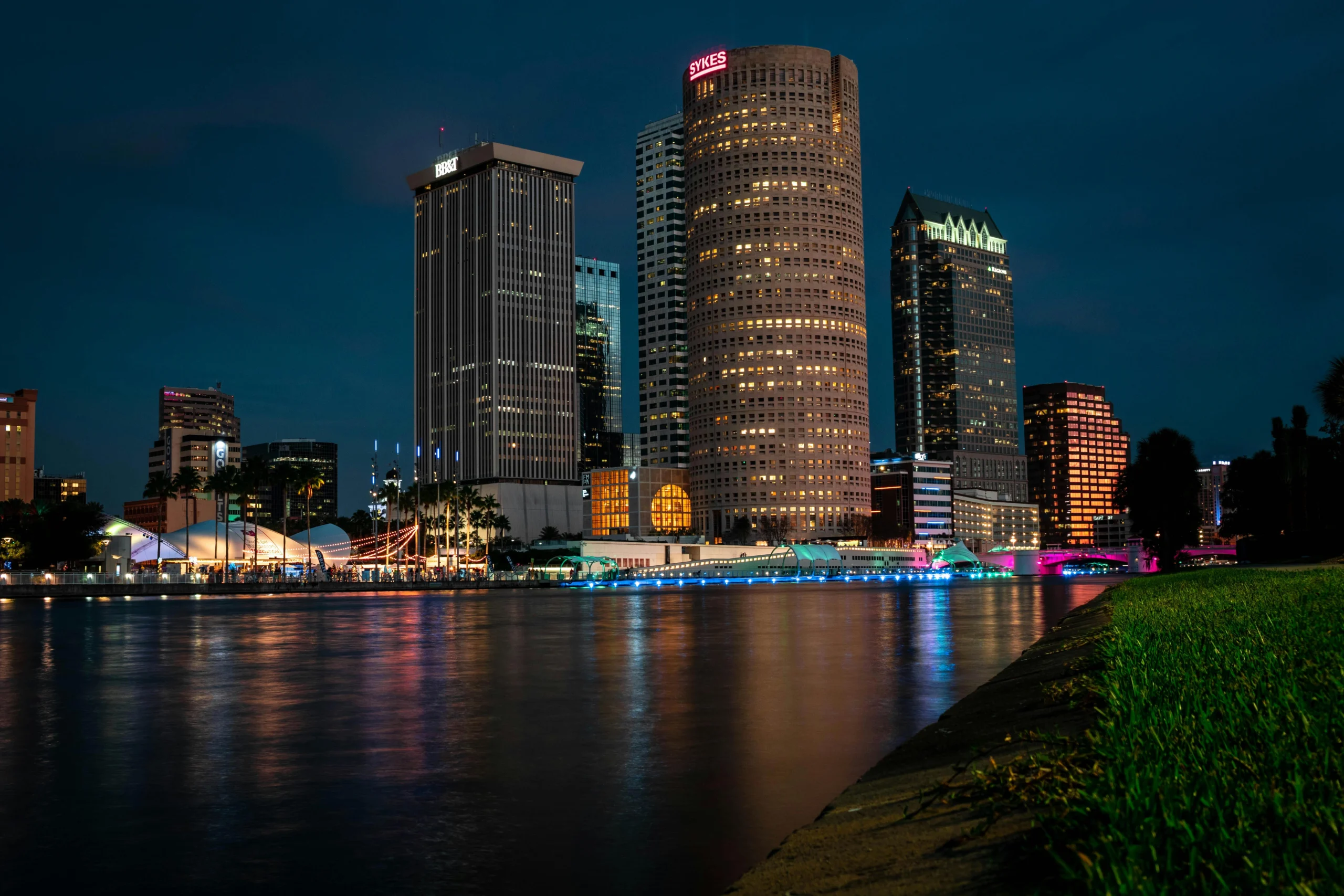 Downtown Tampa lit up at night from across the Hillsborough River